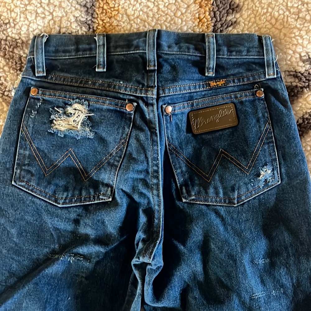 Distressed wrangler jeans